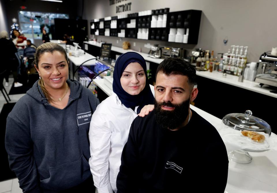 The Flower Shop Detroit X The Coffee Shop Detroit is a family affair. Nedaa Sobh, left, is a co-owner of the flower and coffee shop in Dearborn Heights with fellow co-owners Kawthar Sobh, 27, and her husband, Mikey Sobh at their store on Dec. 9, 2022. The store that is a florist and a coffee shop in one opened up in October 2022.