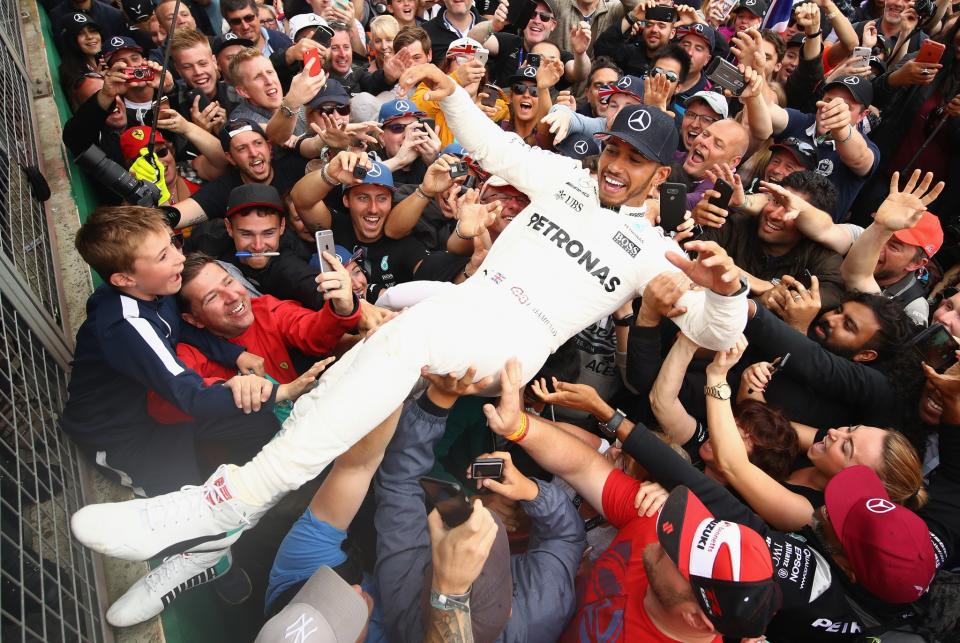 Lewis Hamilton was swept away by fans after winning a fifth British Grand Prix