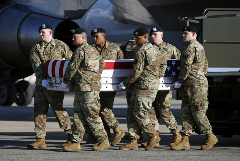 A U.S. Army carry team moves a transfer case containing the remains of Spc. Joseph P. Collette, Sunday, March 24, 2019, at Dover Air Force Base, Del. According to the Department of Defense, Collette, of Lancaster, Ohio, was killed March 22 while involved in combat operations in Kunduz Province, Afghanistan. (AP Photo/Patrick Semansky)