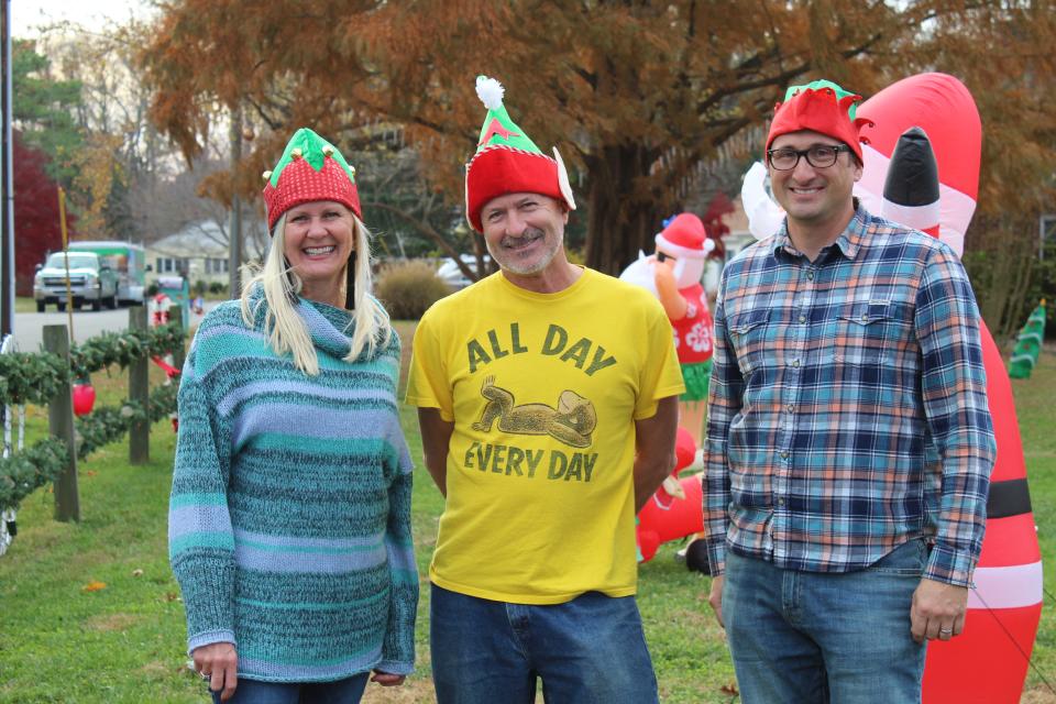 Neighbors Tracy Zigman, Ed Tessein and Mike DiPaolo live on Sussex Drive where the Lewes Christmas parade starts. They've all enjoyed participating in Lewes Lights, a newer tradition that they say makes Christmas time in Lewes even more special.