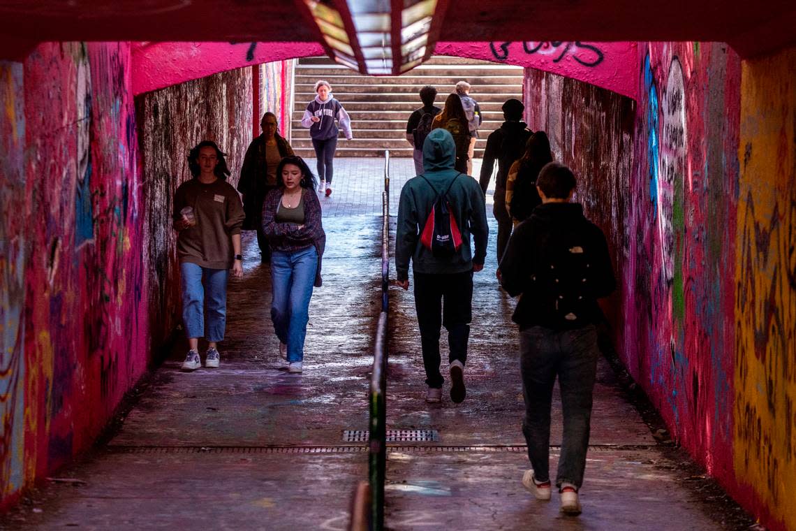 Students traverse the Free Expression Tunnel on N.C. State’s main campus Monday, Feb. 13, 2022.