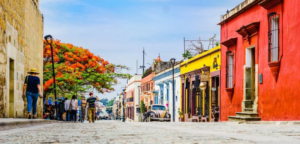 Many of the streets in Oaxaca are lined with colourful, colonial buildings (Getty Images)