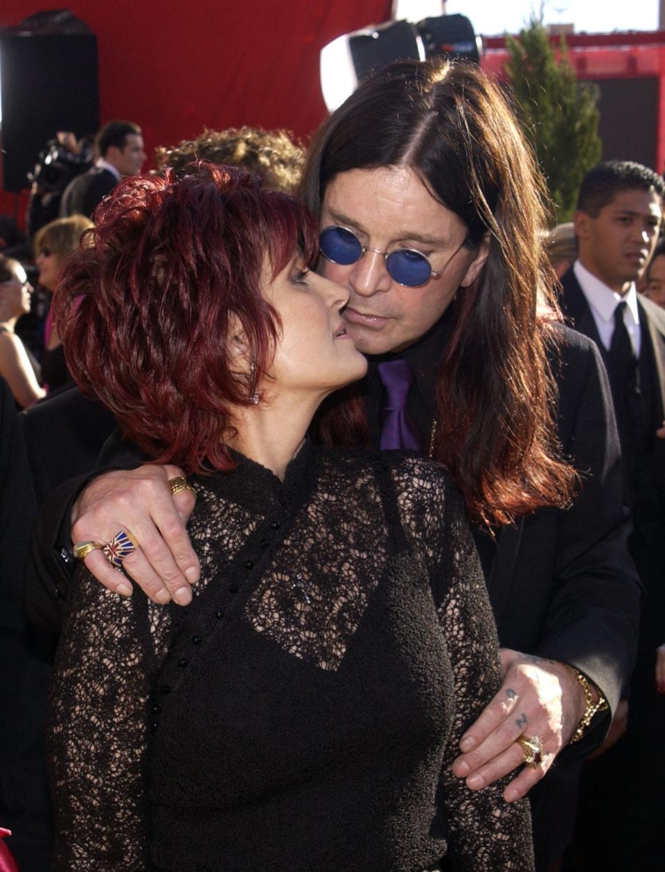 The couple embracing at an event