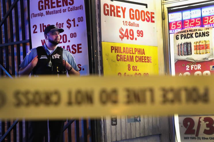 Police guard the scene where a man was shot several times on May 27, 2017, in Chicago.