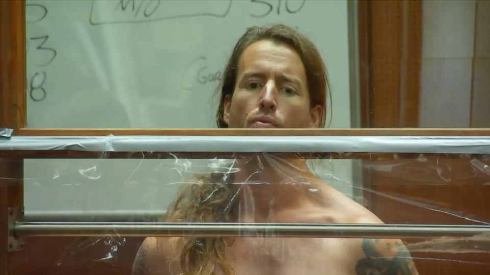 Samuel Haskell Jr stands shirtless in a Los Angeles County courtroom during a hearing on 8 December (KTLA)