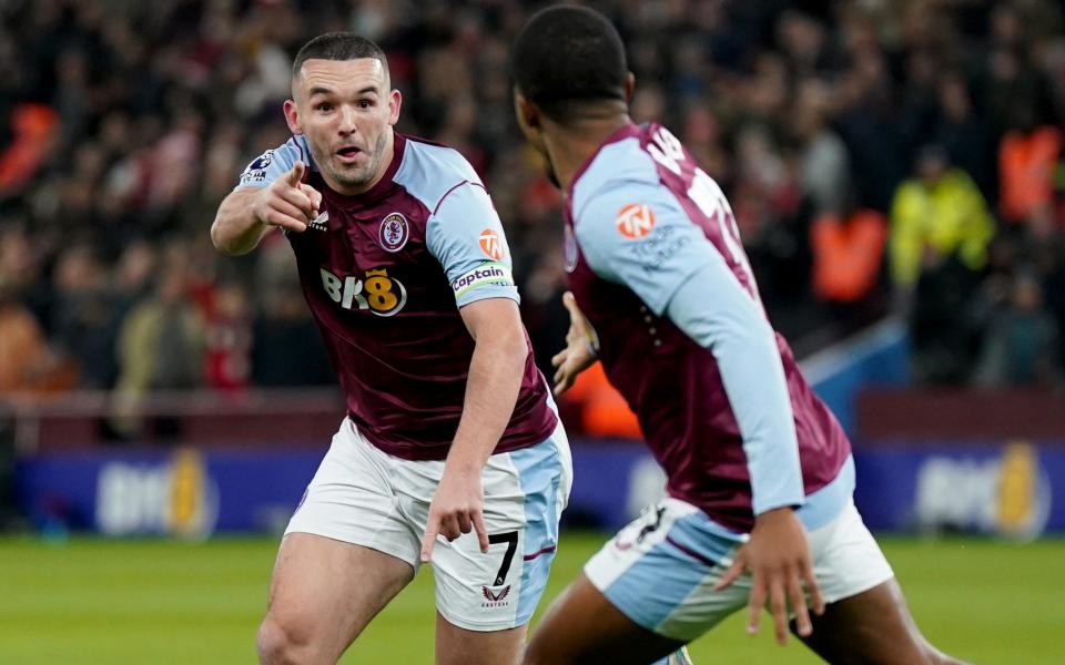 John McGinn (L) - Unai Emery has become football's great outsider after Aston Villa dent Arsenal's title bid