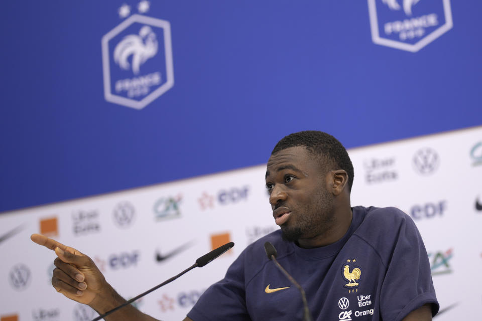 France's Youssouf Fofana answers questions during a press conference at the Jassim Bin Hamad stadium in Doha, Qatar, Thursday, Dec. 8, 2022. France will play against England during their World Cup quarter-final soccer match on Dec. 10. (AP Photo/Christophe Ena)