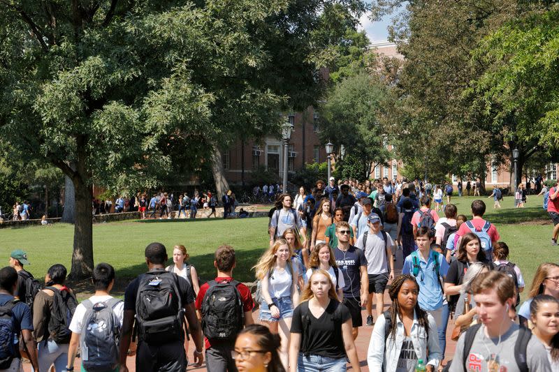 FILE PHOTO: Students walk through the campus of the University of North Carolina at Chapel Hill North Carolina