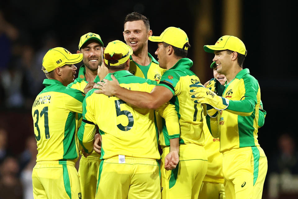 Josh Hazlewood celebrates dismissing Virat Kohli of India during game one of the One Day International series between Australia and India at Sydney Cricket Ground.