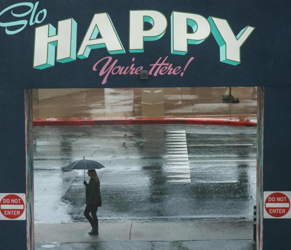 Rain falls in downtown San Luis Obispo, along Marsh Street near the Masonic Lodge Dec. 23, 2021.