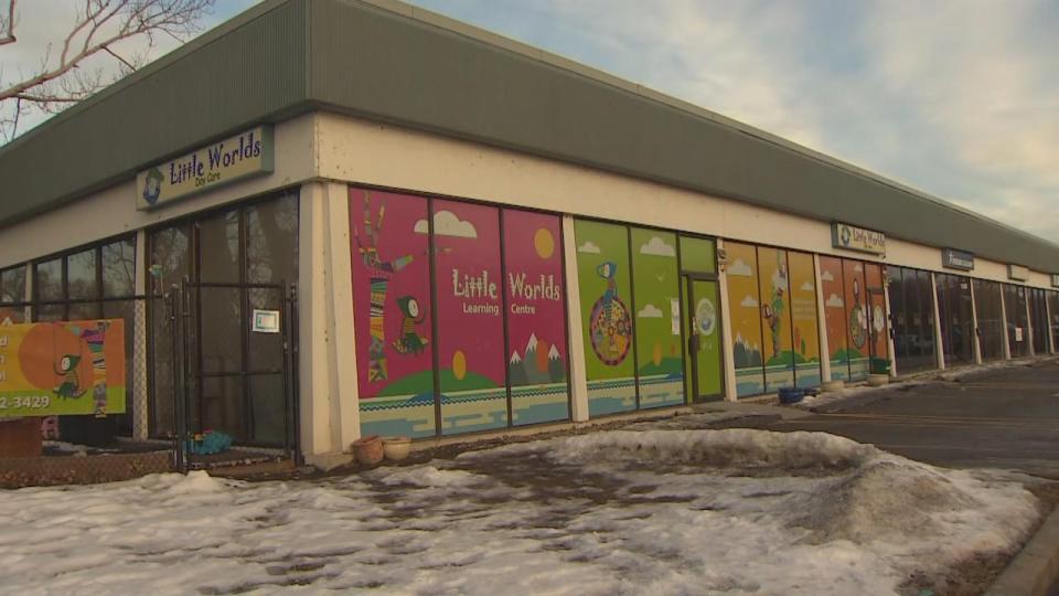 One of the child-care centres taking part in Tuesday's protest, Little Worlds Learning Centre in Deerfoot Meadows in Calgary, Alta., is pictured with notices posted to the building's exterior informing about the closure. 