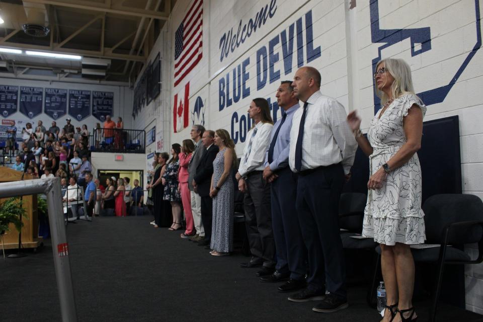 Teaching and administrative staff watch as their 2023 students graduate during the Sault High graduation on May 28, 2023.