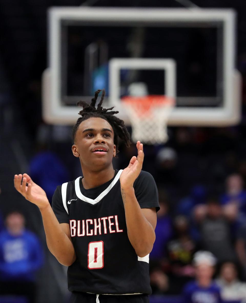 Buchtel's Diaire Pride Jr. celebrates as the Griffins lead late in the second half of a Division II state semifinal against Bishop Ready, Friday, March 17, 2023, in Dayton.