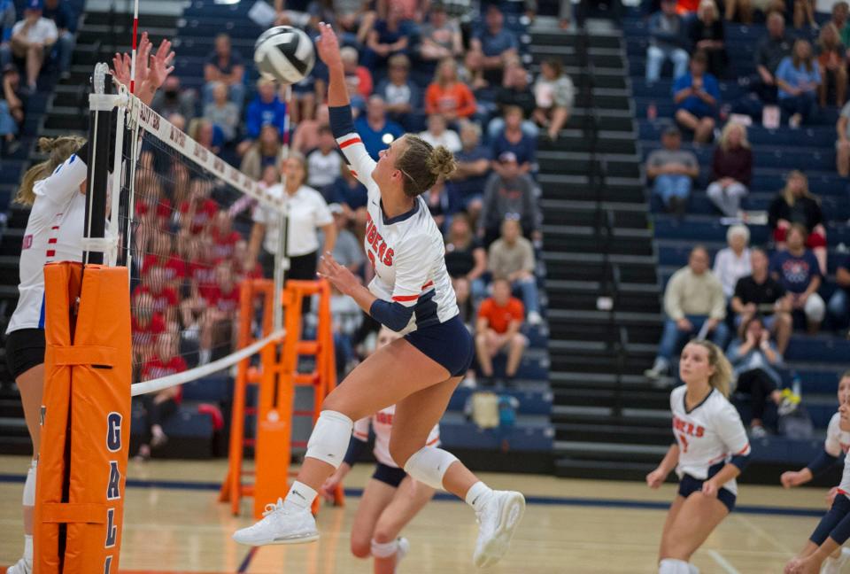 Galion's Ashley Dyer smashes a ball into the Highland defense.