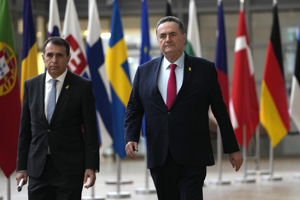 Israel's Foreign Minister Israel Katz, right, arrives for a meeting of EU foreign ministers at the European Council building in Brussels, Monday, Jan. 22, 2024. European Union Foreign Affairs Ministers meet in Brussels on Monday to discuss the situation in the Middle East and in Ukraine. (AP Photo/Virginia Mayo)