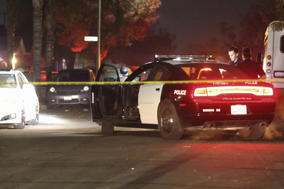 Police work at the scene of a shooting, Sunday, Nov. 17, 2019, in southeast Fresno, Calif. (Photo: Larry Valenzuela/The Fresno Bee via AP)