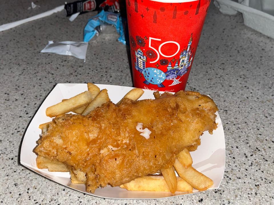 fish and chips and a drink from yorkshire fish shoppe in epcot at disney world