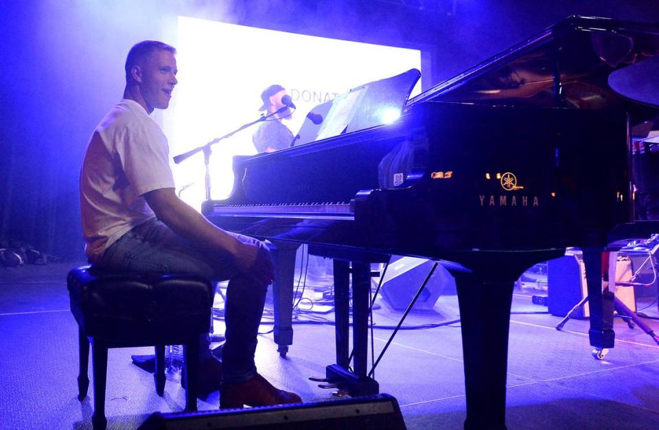 Carolina Panthers running back Christian McCaffrey played the piano during a benefit concert with country singer Zach Bryan on Friday, July 2, 2021 at The Fillmore Charlotte. Bryan is an active-duty member of the US Navy and recently joined the board of directors for McCaffreyÕs foundation. McCaffrey says, Òall proceeds from the concert will go directly to 22 and Troops,Ó which has partnered with REBOOT Recovery, focusing on a 360 degree approach to help active duty military and veterans who are fighting the battle to overcome trauma and PTSD.