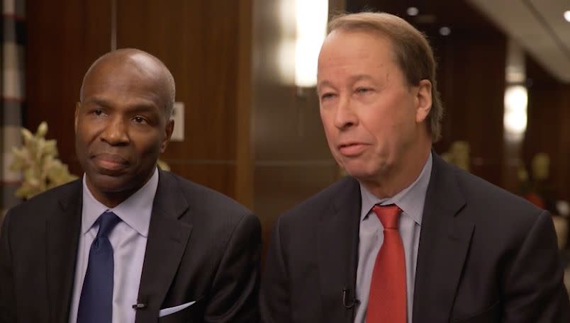 Jim Runcie (L), executive director of the Education Finance Institute, and Tony James, executive vice chairman of The Blackstone Group, support income share agreements as an alternative to traditional student loans. 