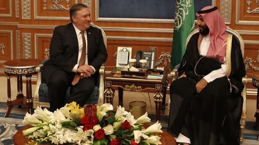 U.S. Secretary of State Mike Pompeo meets with the Saudi Crown Prince Mohammed bin Salman in Riyadh, Saudi Arabia, Tuesday Oct. 16, 2018. Pompeo also met on Tuesday with Saudi King Salman over the disappearance and alleged slaying of Saudi writer Jamal Khashoggi, who vanished two weeks ago during a visit to the Saudi Consulate in Istanbul. (Leah Millis/Pool via AP)