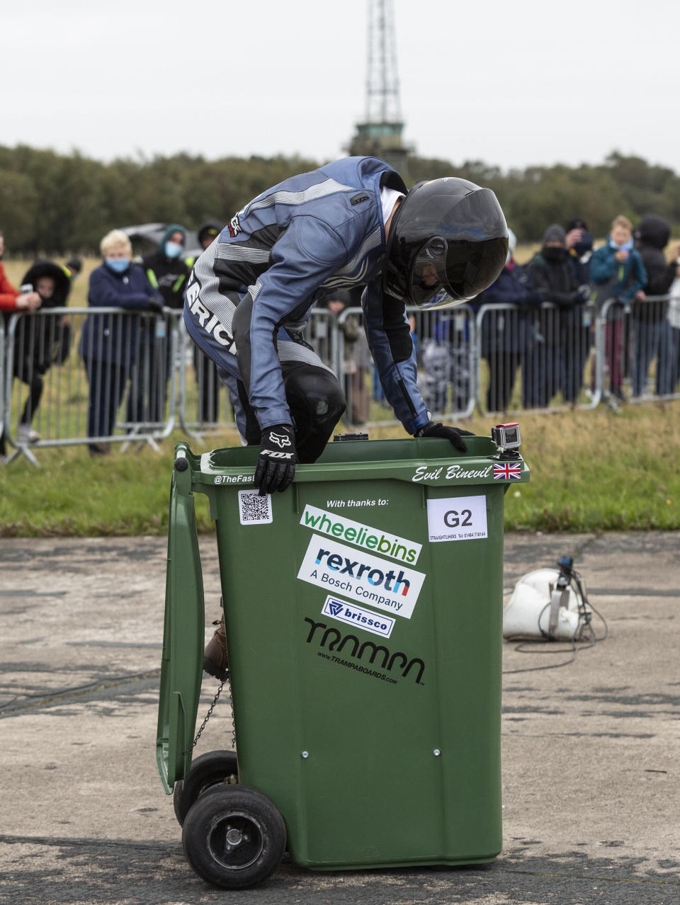 Wacky design engineer sets new Guinness World Record after reaching speeds of over 40mph - in a WHEELIE BIN