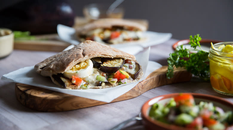 stuffed pita sandwich on board