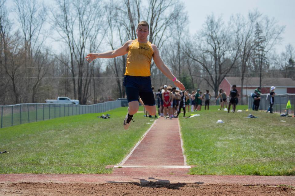 Hillsdale Junior Peter Moore competes in the Long Jump competition