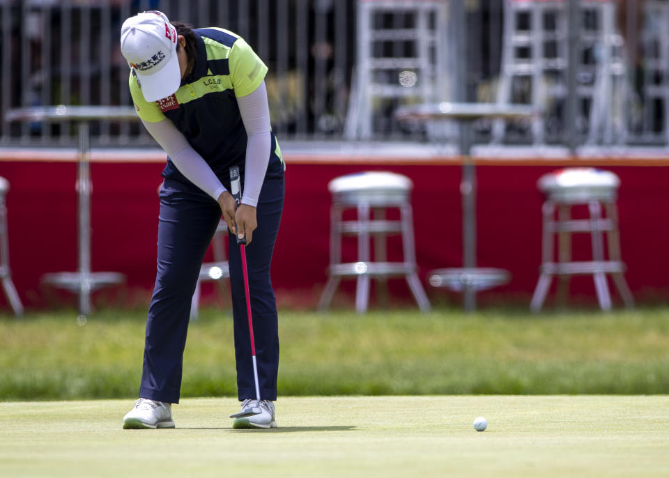 Min Lee putts on the 18th hole during the first round of the Meijer LPGA Classic golf tournament at the Blythefield Country Club in Belmont, Mich., Thursday, June 17, 2021. (Cory Morse/The Grand Rapids Press via AP)