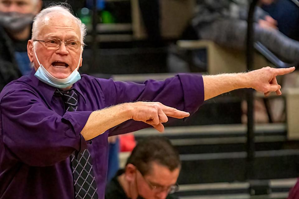 ROWVA/Williamsfield head coach Bob Anderson shouts instructions during the Cougars' 53-35 win over Stark County on Friday, Jan. 21, 2022 at ROWVA High School. The win was the 700th in Anderson's career.