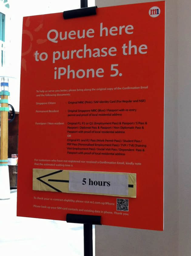 Customers are told to wait at least five hours to collect their iPhone 5. (Photo courtesy of Stephanie Chua)