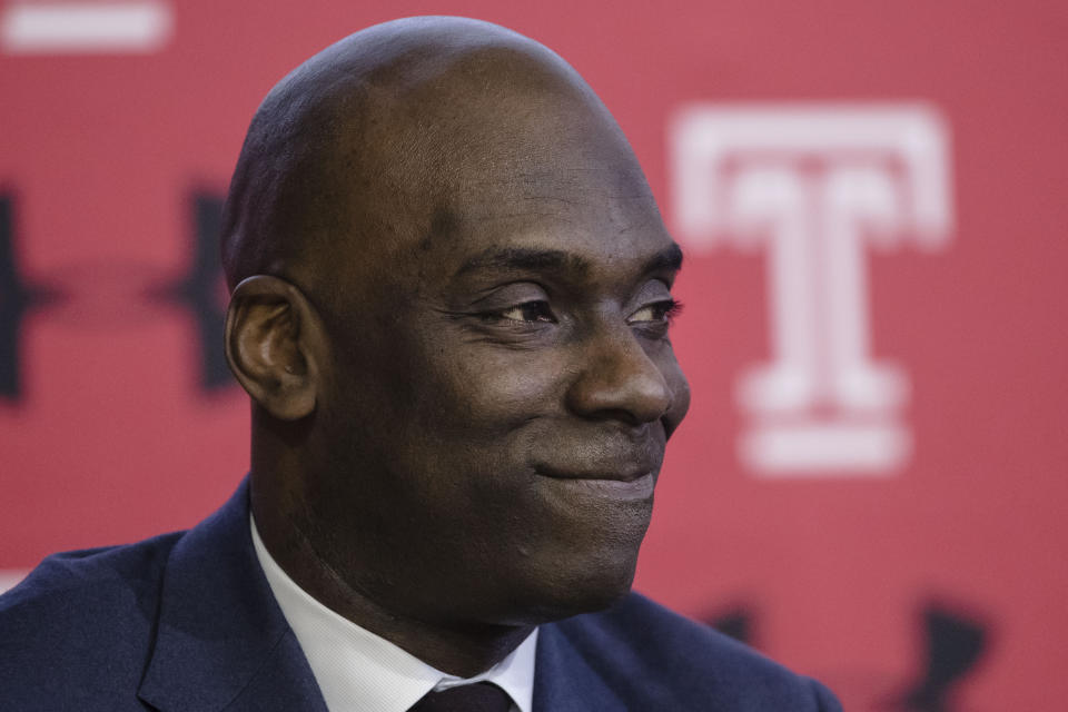 FILE - In this April 2, 2019, file photo Temple NCAA college basketball coach Aaron McKie listens to his introduction during a news conference in Philadelphia. McKie is just the third head coach for Temple since Hall of Famer John Chaney was hired in 1982. (AP Photo/Matt Rourke, File)