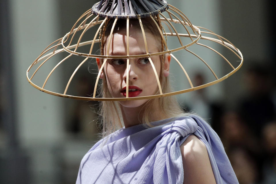 A model wears a creation as part of the Issey Miyake Ready To Wear Spring-Summer 2020 collection, unveiled during the fashion week, in Paris, Friday, Sept. 27, 2019. (AP Photo/Francois Mori)