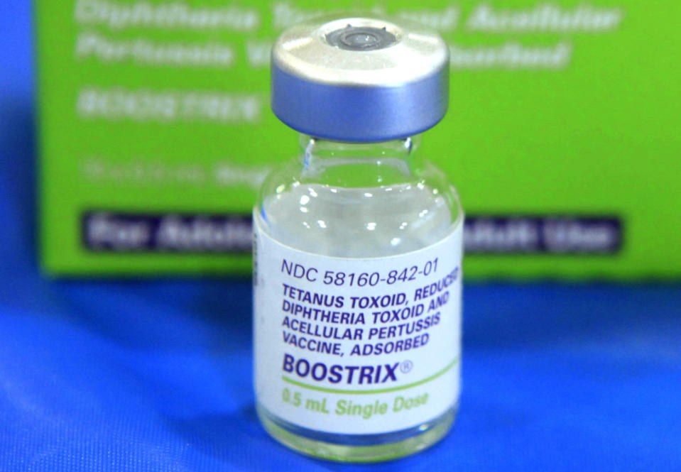 FILE - This Monday, Sept. 19, 2011 file photo shows an empty bottle of tetanus, diphthera and pertussis (whooping cough) vaccine on display at a high school in Sacramento, Calif. On Friday, May 10, 2019, The Associated Press has found that stories circulating on the internet that packaging inserts for diphtheria, tetanus and pertussis vaccines list autism as a possible side effect on the Food and Drug Administration’s website, are untrue. The FDA says, “This question of a purported link between vaccines and autism has been exhaustively studied over many years, in dozens of investigations and through some of the largest scientific studies ever undertaken.” (AP Photo/Rich Pedroncelli)