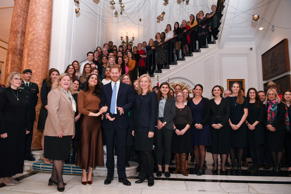 LONDON, UNITED KINGDOM - JANUARY 07: Prince Harry, Duke of Sussex and Meghan, Duchess of Sussex stand with the High Commissioner for Canada in the United Kingdom, Janice Charette (4thL) and the deputy High Commissioner, Sarah Fountain Smith (7thL), as they pose for a photograph with High Commission staff during their visit to Canada House in thanks for the warm Canadian hospitality and support they received during their recent stay in Canada, on January 7, 2020 in London, England. (Photo by DANIEL LEAL-OLIVAS  - WPA Pool/Getty Images)