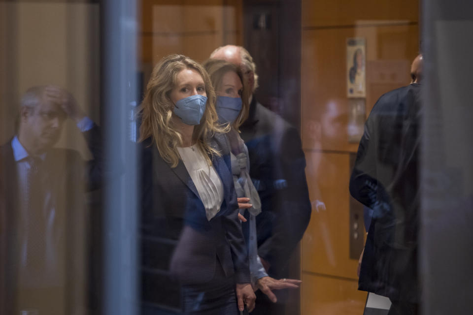 Elizabeth Holmes leaves the United States Federal Courthouse in San Jose, Calif., Wednesday, Sept. 8, 2021. Her company Theranos failed in 2018, a few years after a series of explosive stories in The Wall Street Journal exposed serious flaws in its technology and spurred regulatory investigations that shut down the testing. (AP Photo/Nic Coury)