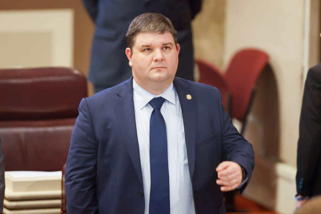 A man standing in the Alabama House chamber