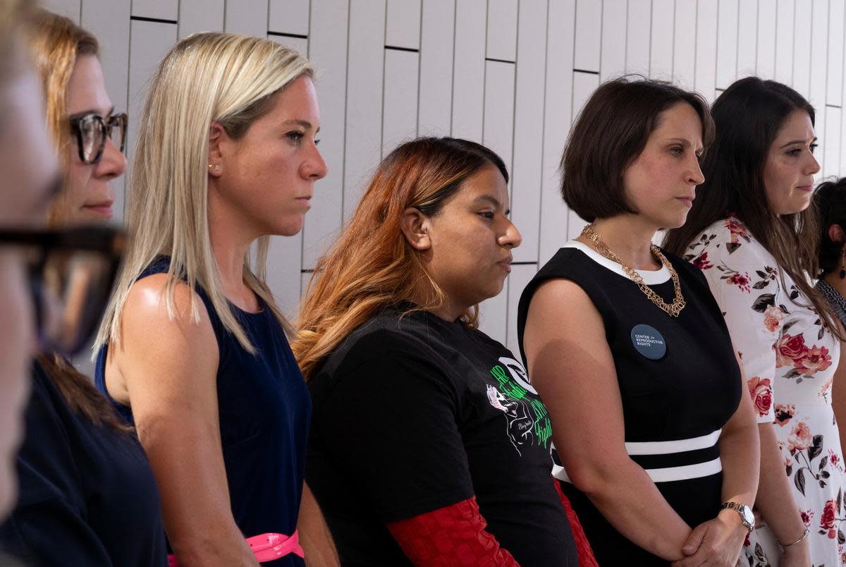 Amanda Zurawski, Samantha Casiano, Molly Duane, senior staff attorney for the Center for Reproductive Rights, and Ashley Brandt, address the press following the first day of testimony for Zurawski v. State of Texas outside the Travis County Civil and Family Courts Facility in Austin on July 19, 2023.