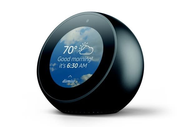 Amazon.com's Echo Spot displaying a good morning screen.