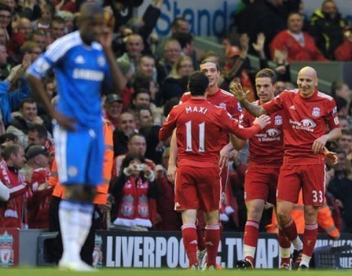 File picture shows Liverpool players celebrating a goal during their 4-1 win at Anfield in May. Chelsea manager Roberto Di Matteo admits Liverpool have become Chelsea's "bogey team" ahead of the visit of Brendan Rodgers' side to Stamford Bridge on Sunday