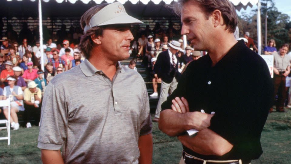 Costner (right) speaks to his rival in 'Tin Cup,' David Simms, played by Don Johnson. - PictureLux/The Hollywood Archive/Alamy