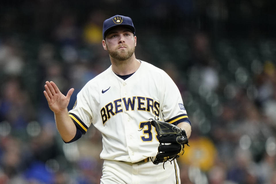 FILE -Milwaukee Brewers' Corbin Burnes reacts as he walks to the dugout during the fourth inning of a baseball game against the St. Louis Cardinals, Thursday, Sept. 28, 2023, in Milwaukee. Baseball’s next free agency class won’t have a two-way star like Shohei Ohtani, and almost certainly no deals like his record-shattering $700 million over 10 years to switch teams in Los Angeles this year. But there could still be All-Star sluggers and Cy Young Award winners available next offseason.(AP Photo/Aaron Gash, File)