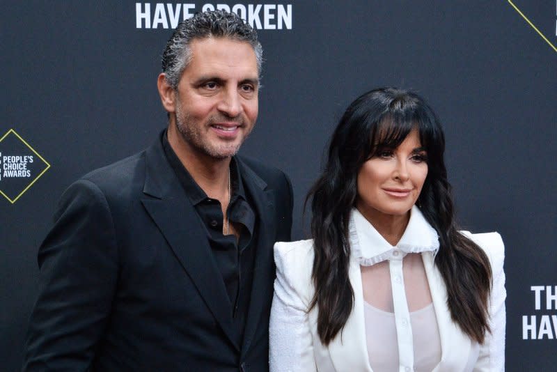 Kyle Richards (R) and Mauricio Umansky attend the E! People's Choice Awards in 2019. File Photo by Jim Ruymen/UPI