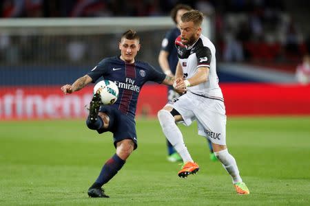 Football Soccer - Paris St Germain v Guingamp - French Ligue 1 - Parc des Princes, Paris, France - 9/4/17. Paris St Germain's Marco Verratti and Guingamp's Lucas Deaux in action. REUTERS/Gonzalo Fuente