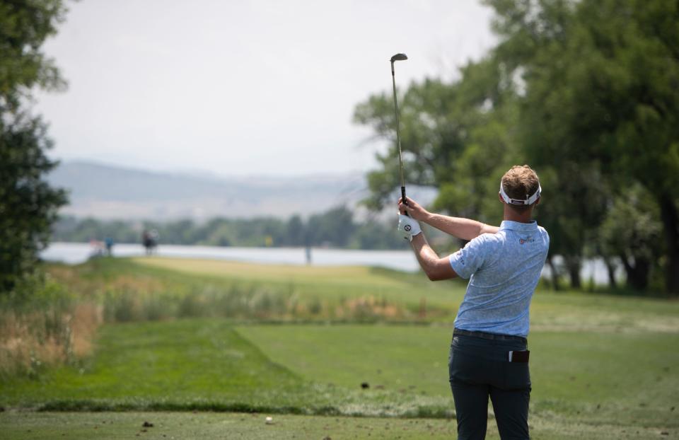 Professional golfer Tyson Alexander tees off on the 8th hole during the TPC Colorado Championship at Heron Lakes in Berthoud in 2021.