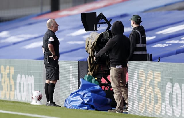 Jonathan Moss had to check the pitchside monitor to downgrade Kyle Walker-Peters' red card