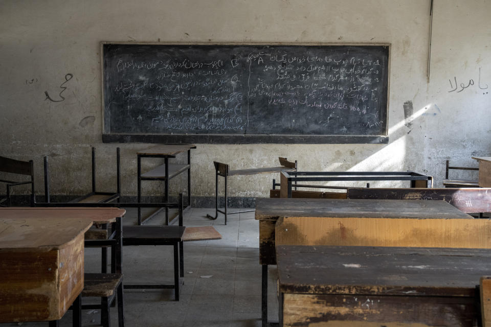 A classroom that previously was used for girls sits empty in Kabul, Afghanistan, Thursday, Dec. 22, 2022. The country's Taliban rulers earlier this week ordered women nationwide to stop attending private and public universities effective immediately and until further notice. They have banned girls from middle school and high school, barred women from most fields of employment and ordered them to wear head-to-toe clothing in public. Women are also banned from parks and gyms.(AP Photo/Ebrahim Noroozi)