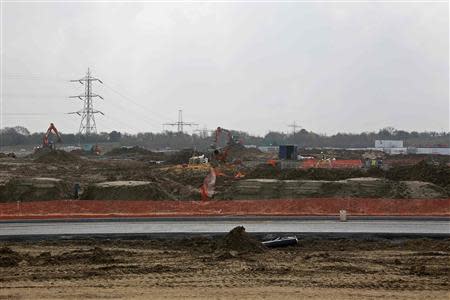 A construction site is seen in Ebbsfleet, southern England March 27, 2014. Under a new government-backed plan, more than 20,000 new homes will be built in Ebbsfleet, 20 miles east of London and just 17 minutes from the centre of the capital on a high-speed rail line. Picture taken on March 27, 2014. To match Analysis BRITAIN-HOUSING/ REUTERS/Stefan Wermuth