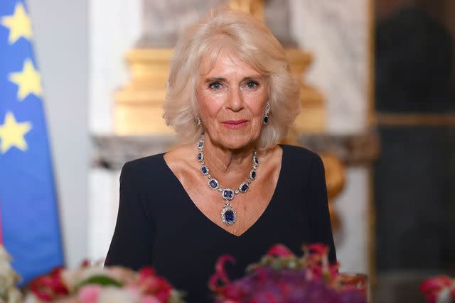 <p>Daniel Leal - Pool/Getty Images</p> Queen Camilla attends a state banquet at the Palace of Versailles on Sept. 20, 2023.