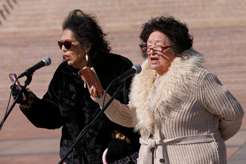 Cheryl Weeden, left, and Paula Carney sing "Amazing Grace" in Choctaw during the opening ceremony of the Oklahoma Bible Reading Marathon Saturday at the state Capitol in Oklahoma City.