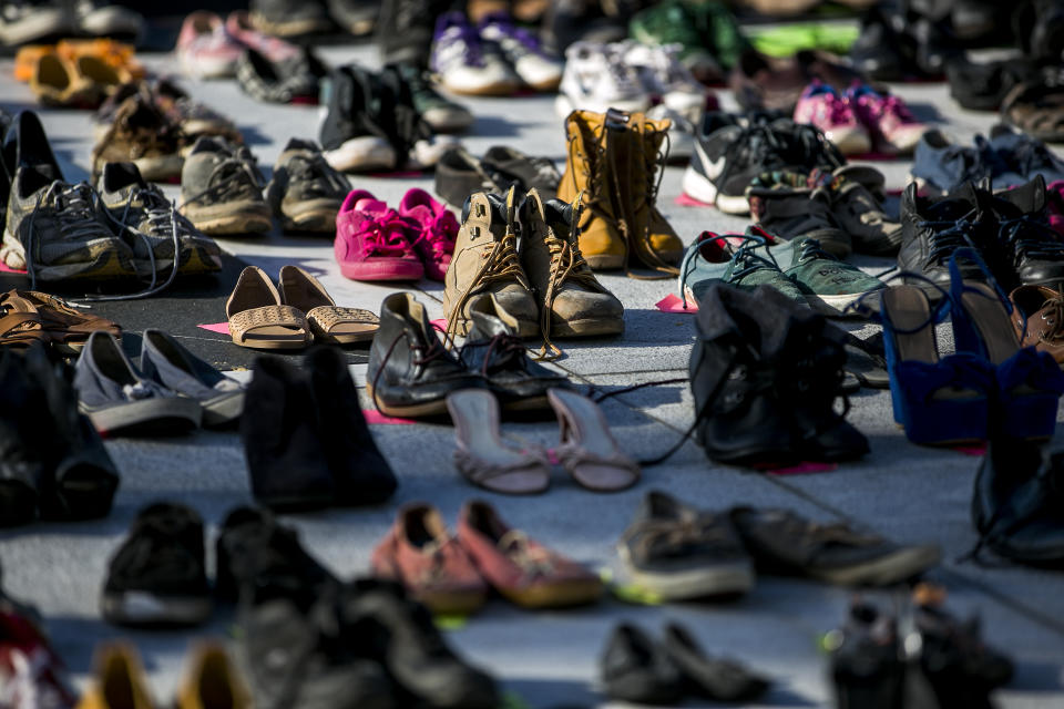 Empty pairs of shoes sit outside the Capitol building in San Juan, Puerto Rico, during a June 1 protest against the government’s reporting of the death toll from Hurricane Maria. (Photo: Xavier Garcia/Bloomberg via Getty Images)